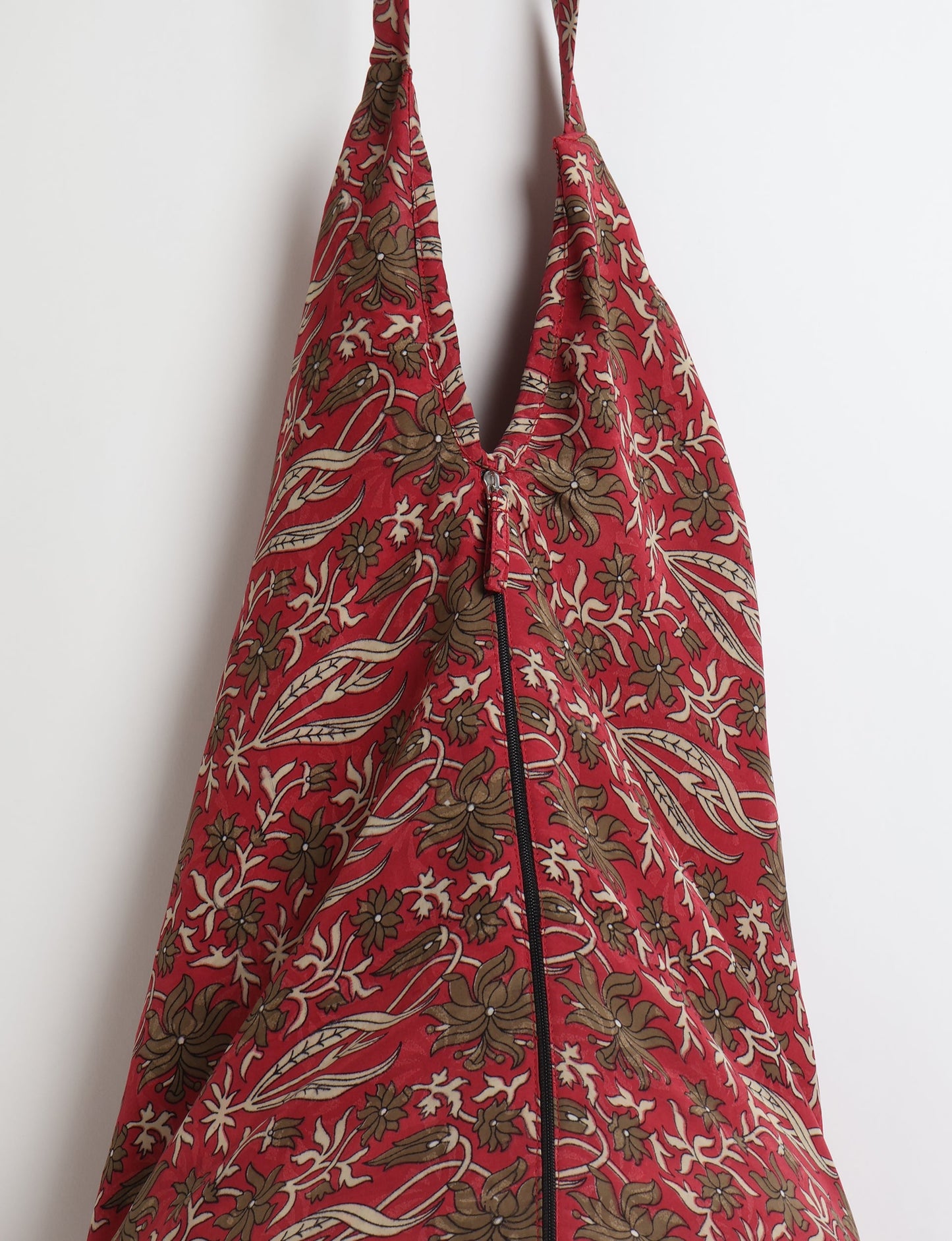 A stylish HOBO BAG made from recycled materials, perfect for eco-conscious fashionistas.