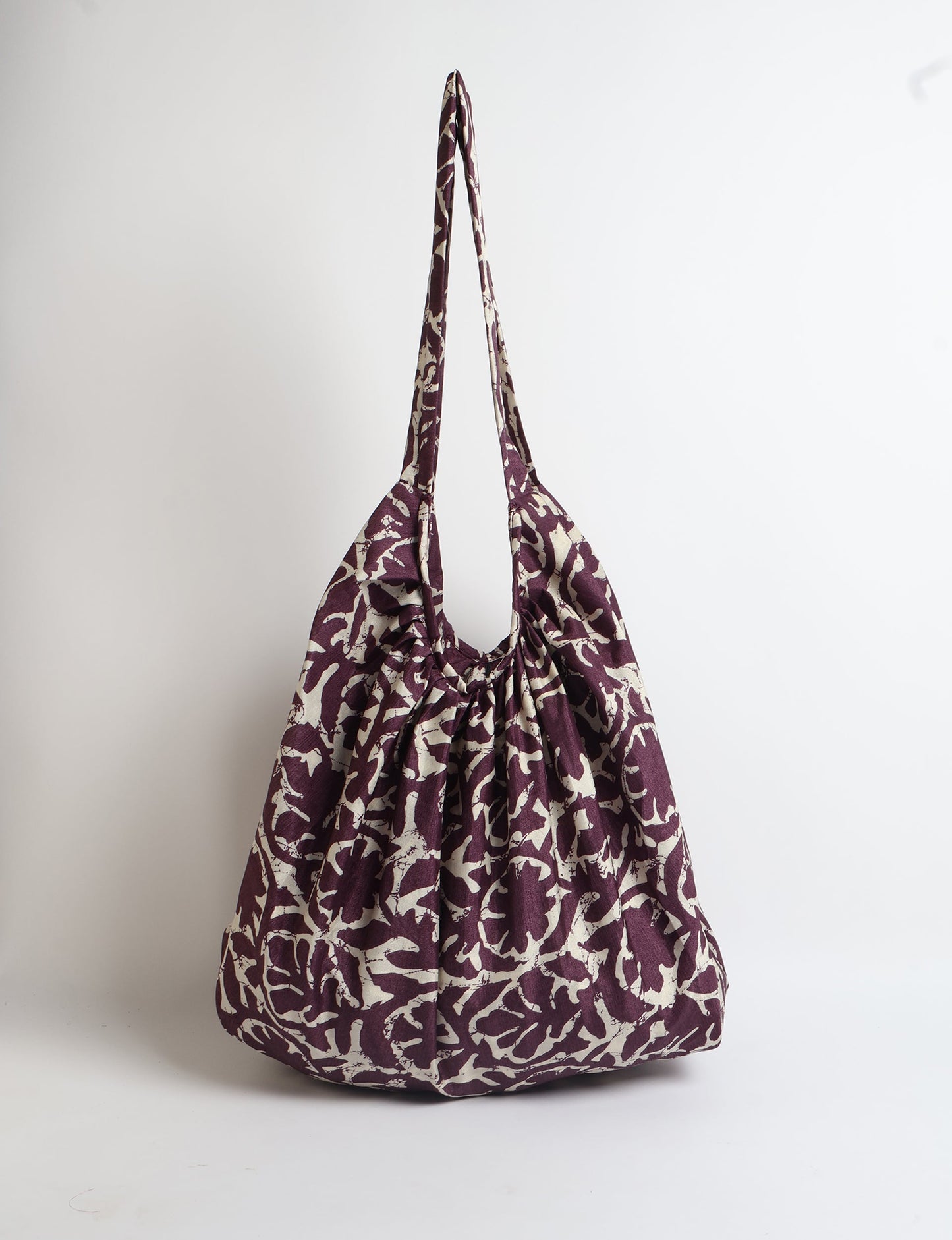 A stylish HOBO BAG made from recycled materials, perfect for eco-conscious fashionistas.