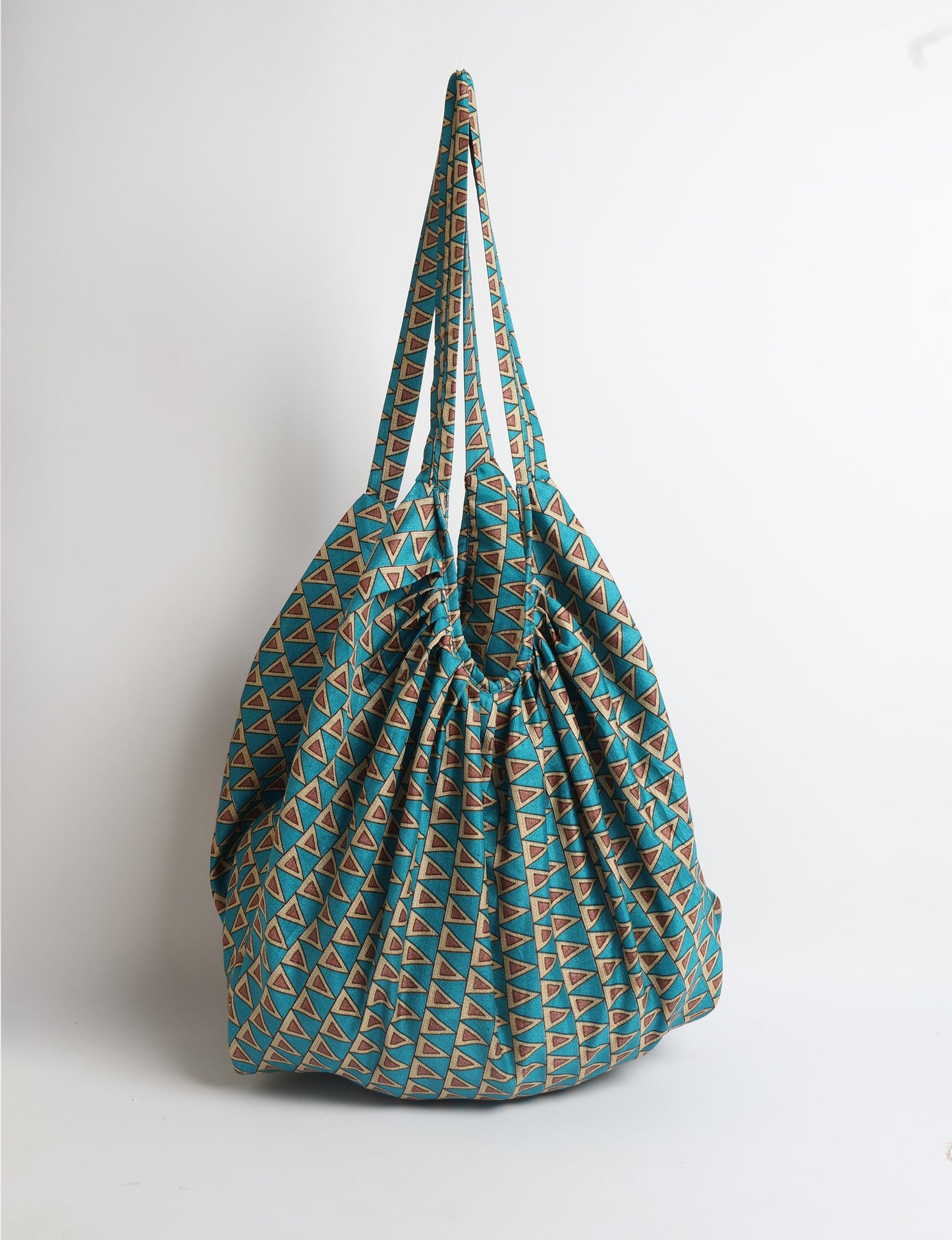 A stylish HOBO BAG made from recycled materials, perfect for eco-conscious fashionistas.