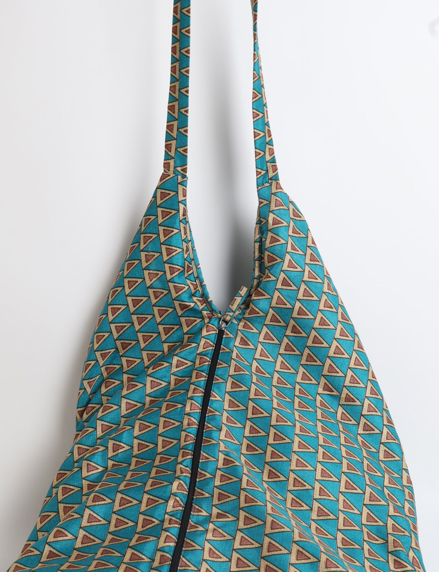 A stylish HOBO BAG made from recycled materials, perfect for eco-conscious fashionistas.
