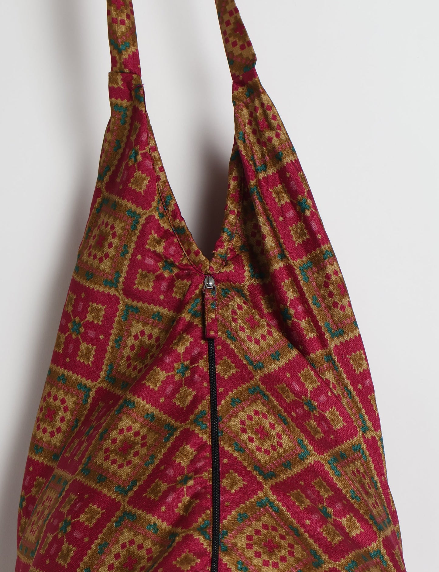 A stylish HOBO BAG made from recycled materials, perfect for eco-conscious fashionistas.