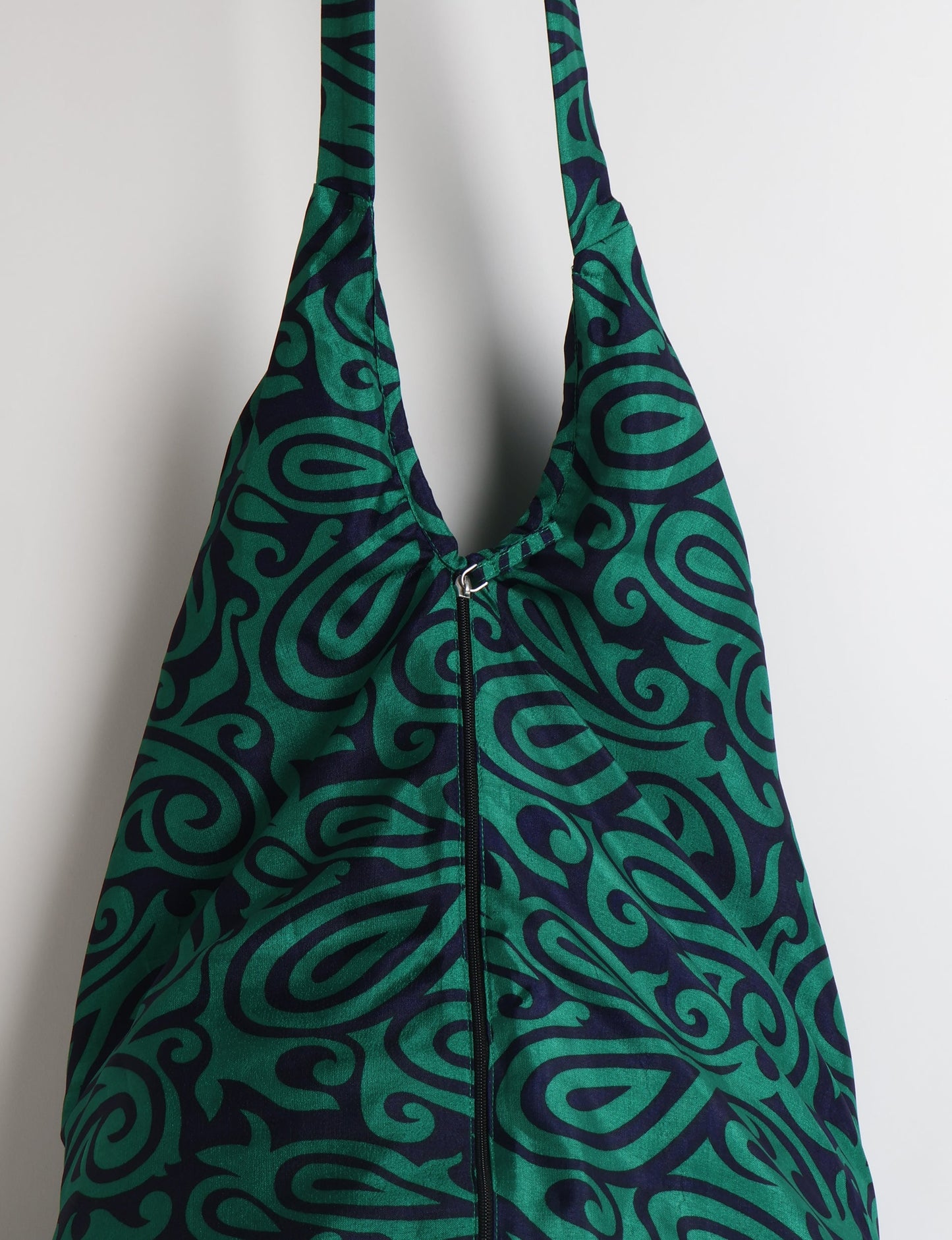 A stylish HOBO BAG made from recycled materials, perfect for eco-conscious fashionistas.
