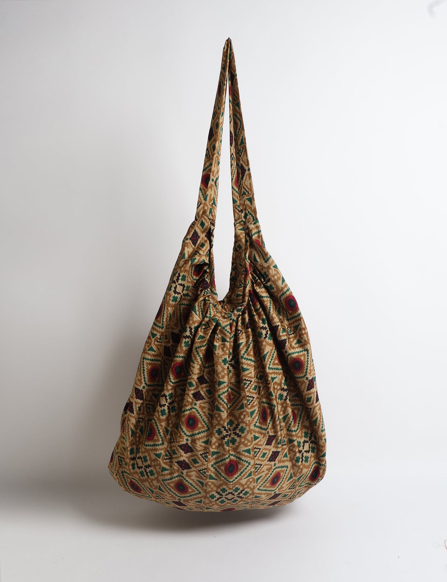 A stylish HOBO BAG made from recycled materials, perfect for eco-conscious fashionistas.