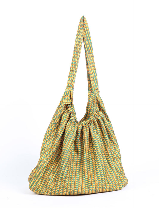 A stylish HOBO BAG made from recycled materials, perfect for eco-conscious fashionistas.