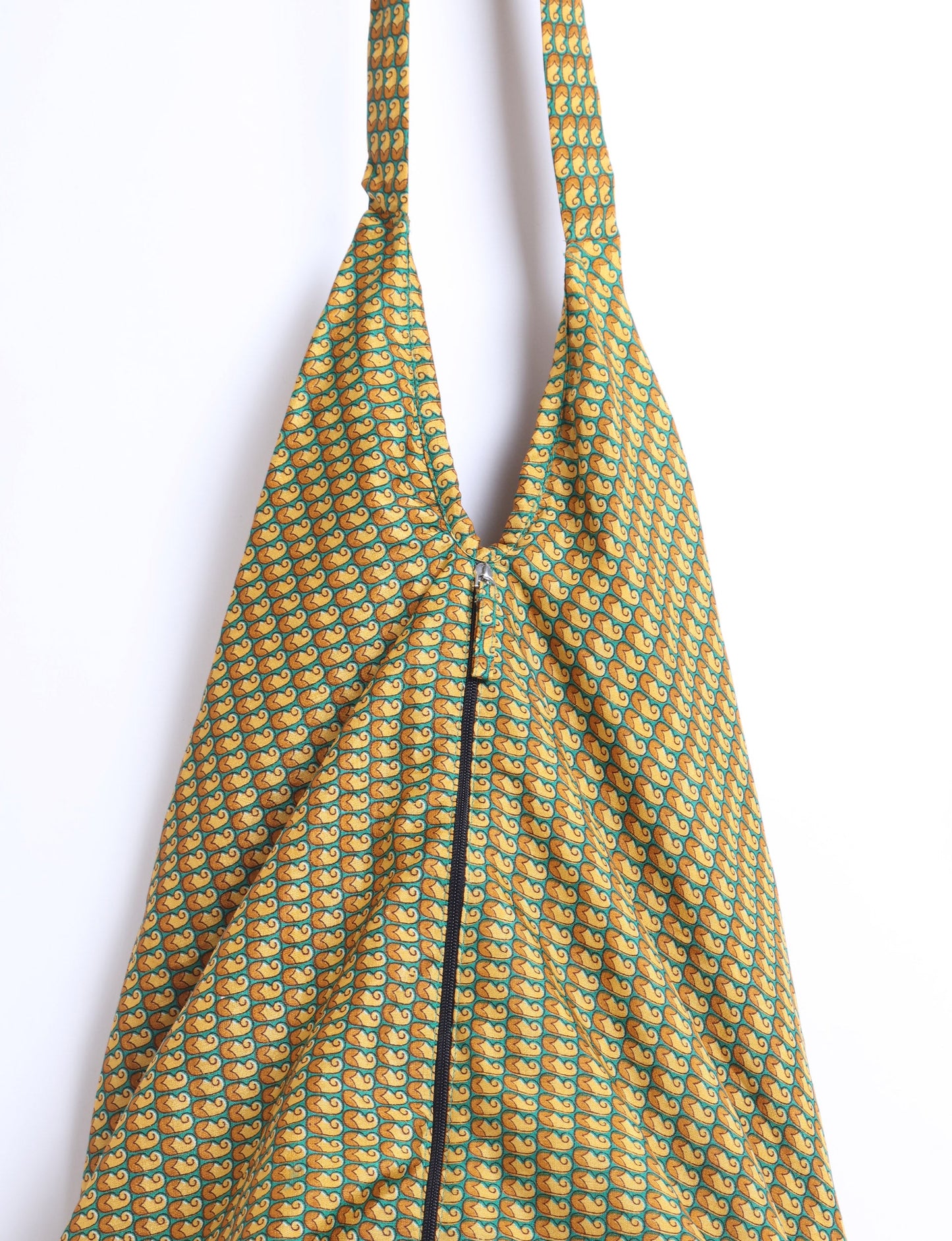 A stylish HOBO BAG made from recycled materials, perfect for eco-conscious fashionistas.