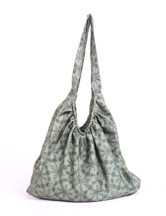 A stylish HOBO BAG made from recycled materials, perfect for eco-conscious fashionistas.