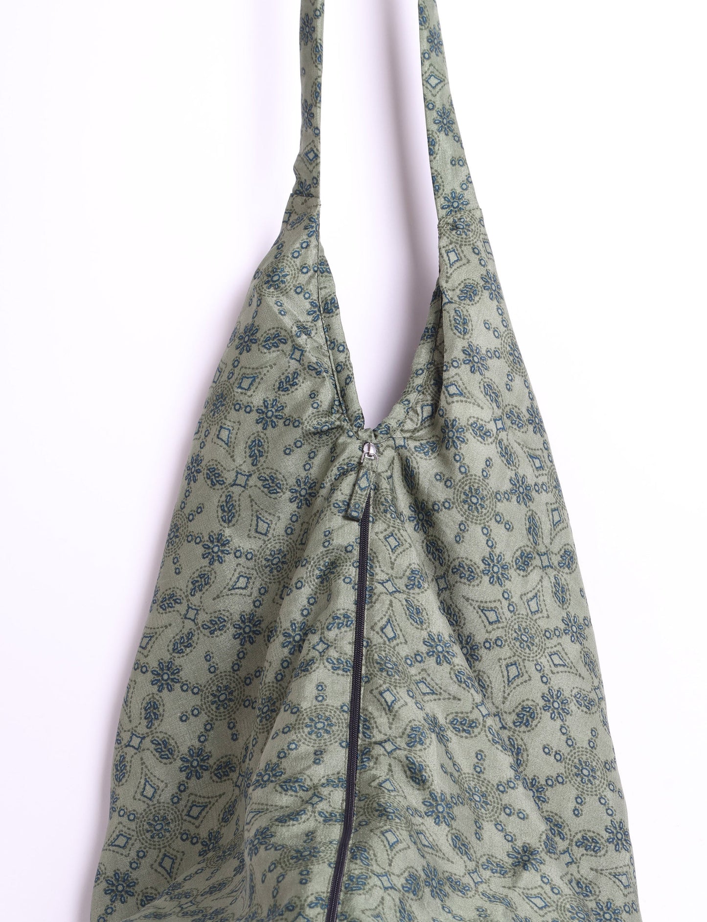 A stylish HOBO BAG made from recycled materials, perfect for eco-conscious fashionistas.