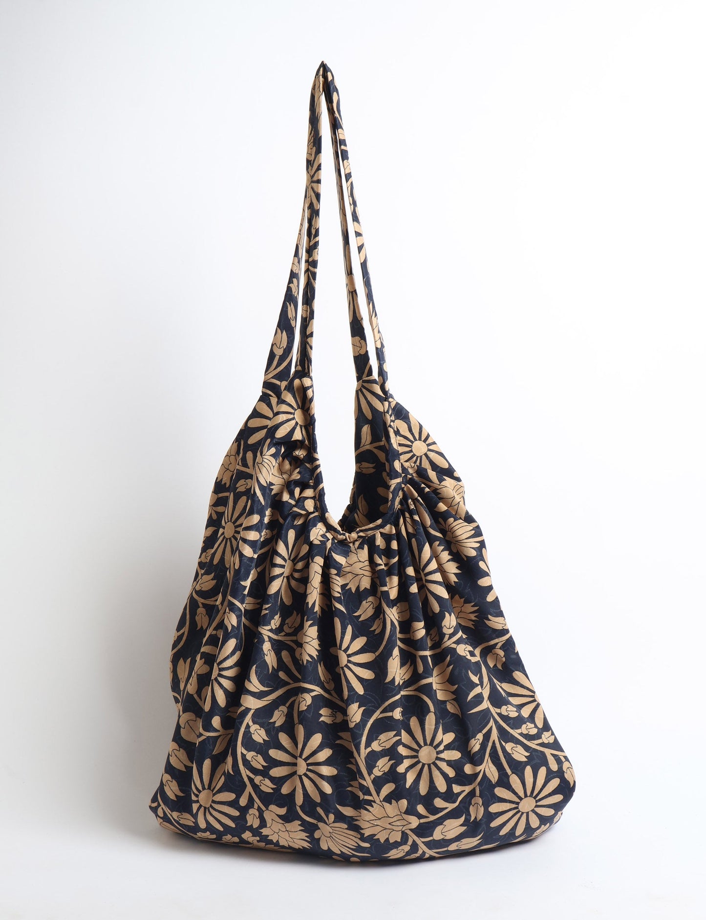 A stylish HOBO BAG made from recycled materials, perfect for eco-conscious fashionistas.