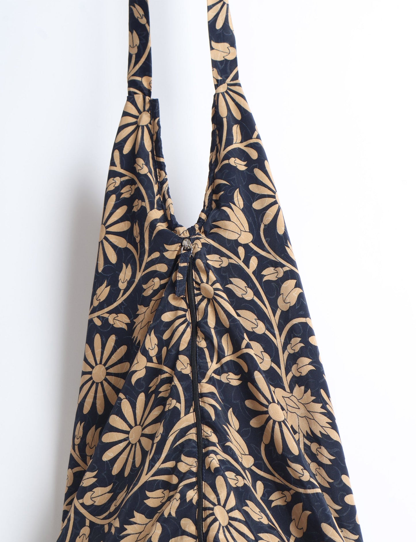 A stylish HOBO BAG made from recycled materials, perfect for eco-conscious fashionistas.