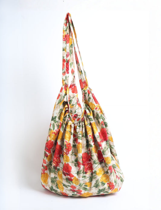 A stylish HOBO BAG made from recycled materials, perfect for eco-conscious fashionistas.