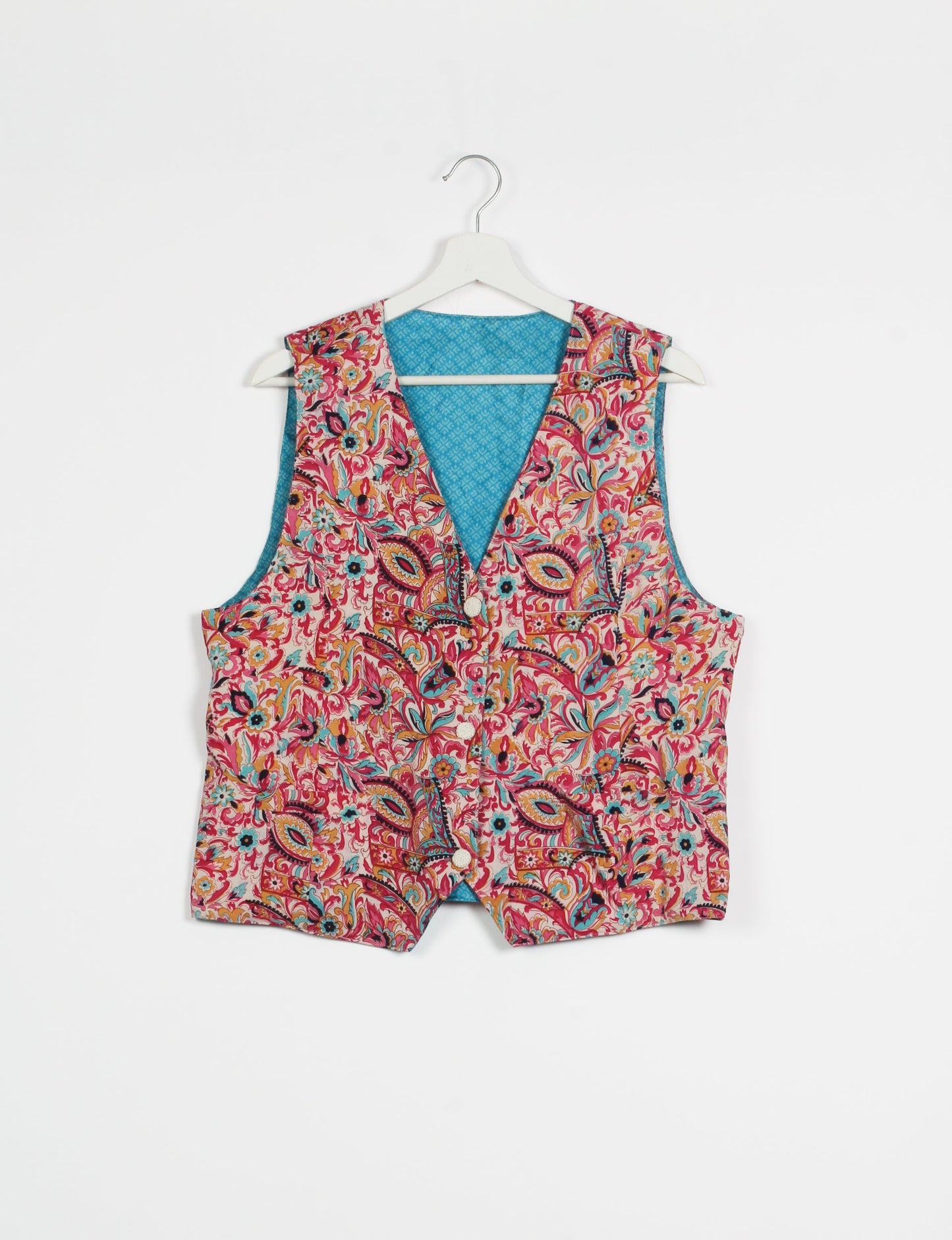 Day Waistcoat made from repurposed saris with macramé-covered buttons, showcasing eco clothing and recycled sari fashion for an eco-friendly, upcycled women's garment.