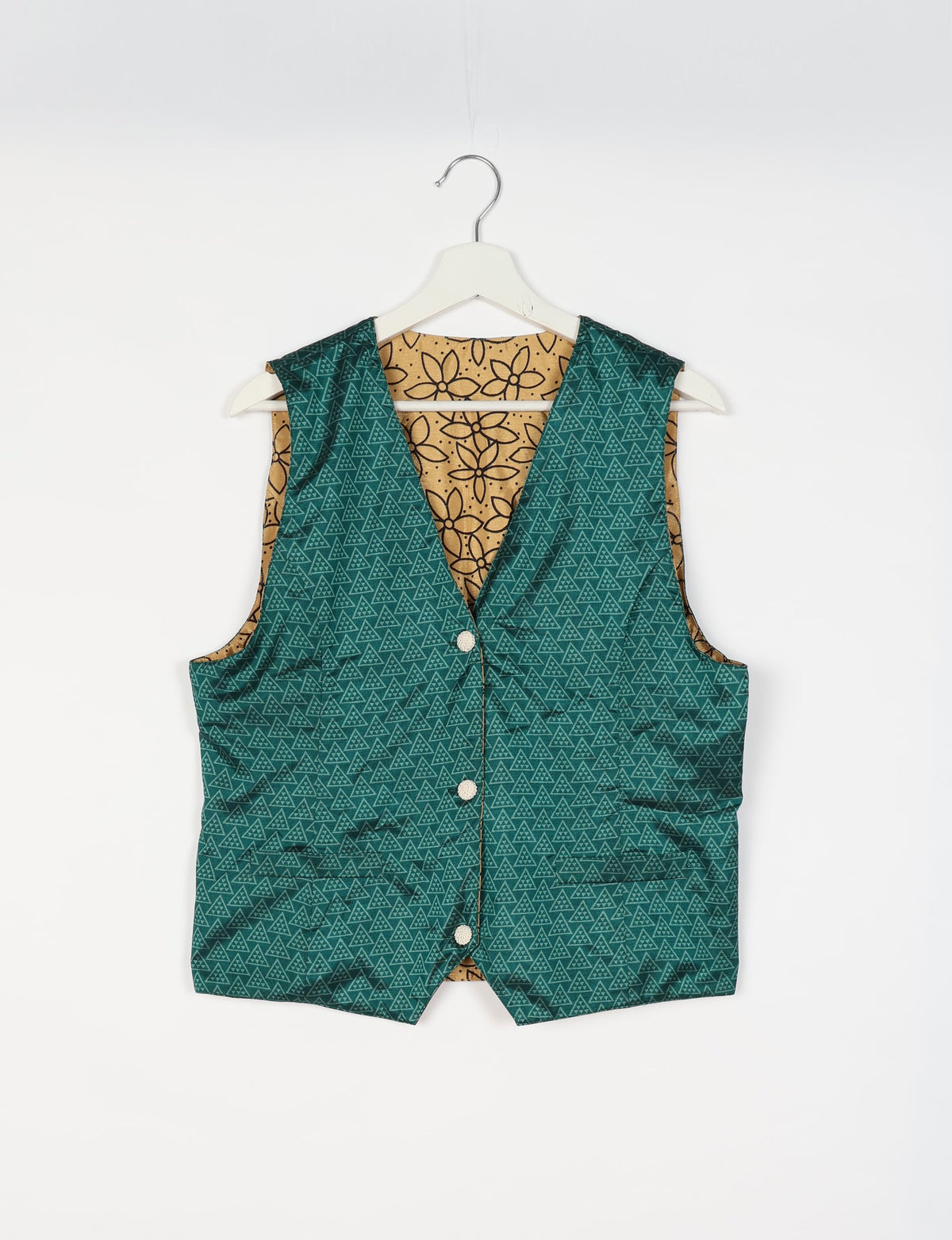 Day Waistcoat made from repurposed saris with macramé-covered buttons, showcasing eco clothing and recycled sari fashion for an eco-friendly, upcycled women's garment.