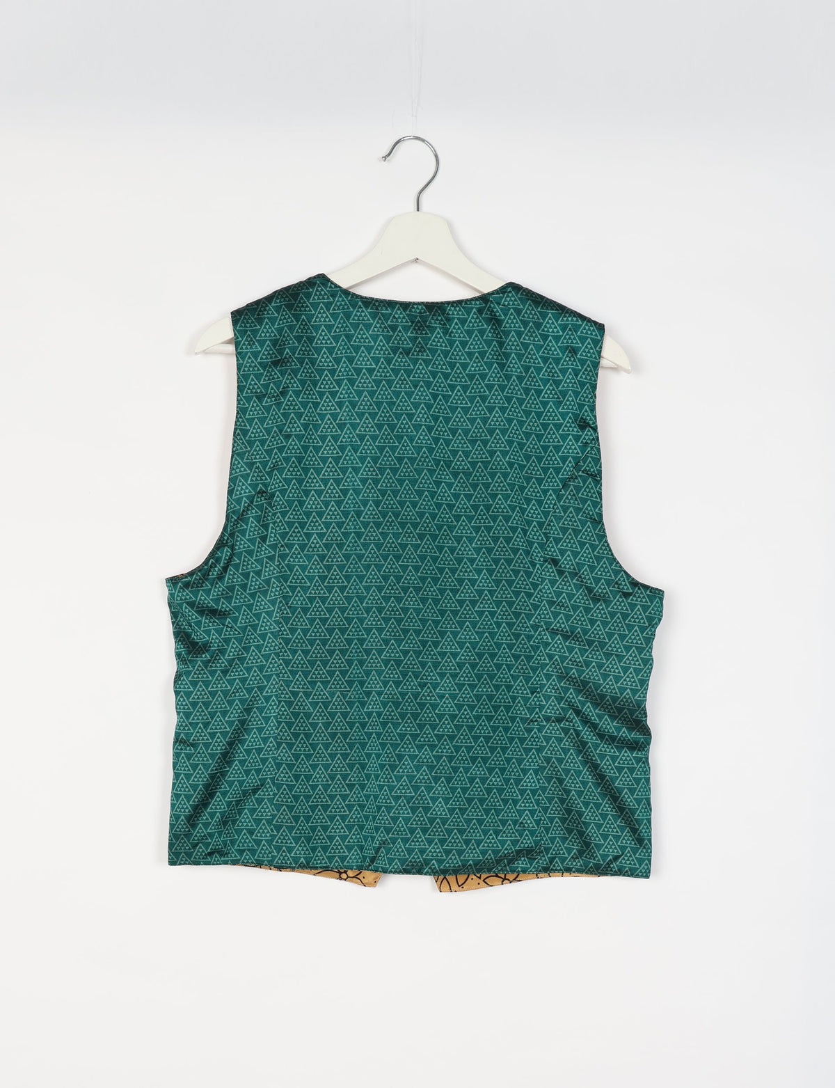 Day Waistcoat made from repurposed saris with macramé-covered buttons, showcasing eco clothing and recycled sari fashion for an eco-friendly, upcycled women's garment.