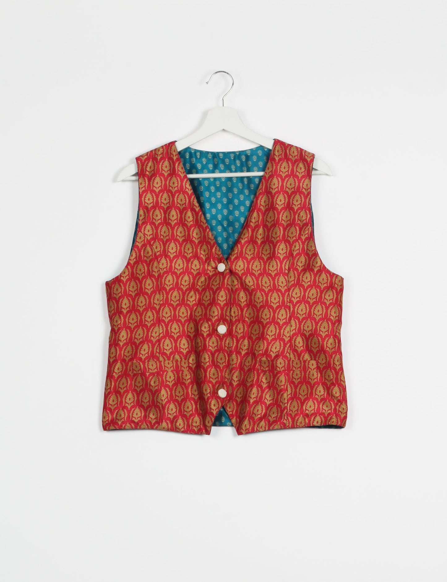 Day Waistcoat made from repurposed saris with macramé-covered buttons, showcasing eco clothing and recycled sari fashion for an eco-friendly, upcycled women's garment.