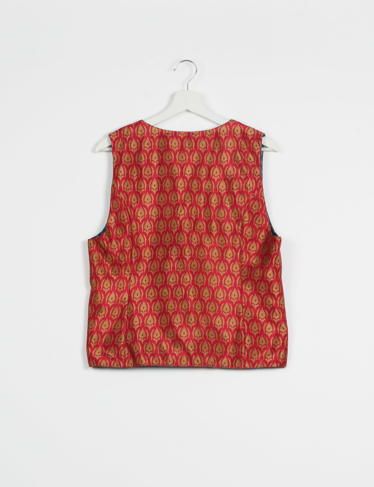 Day Waistcoat made from repurposed saris with macramé-covered buttons, showcasing eco clothing and recycled sari fashion for an eco-friendly, upcycled women's garment.