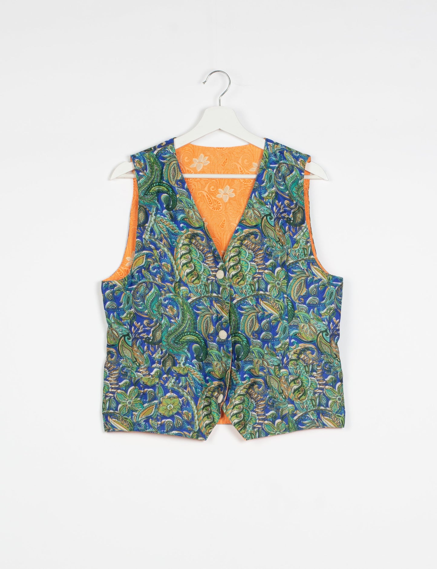 Day Waistcoat made from repurposed saris with macramé-covered buttons, showcasing eco clothing and recycled sari fashion for an eco-friendly, upcycled women's garment.