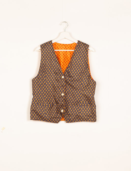 Day Waistcoat made from repurposed saris with macramé-covered buttons, showcasing eco clothing and recycled sari fashion for an eco-friendly, upcycled women's garment.