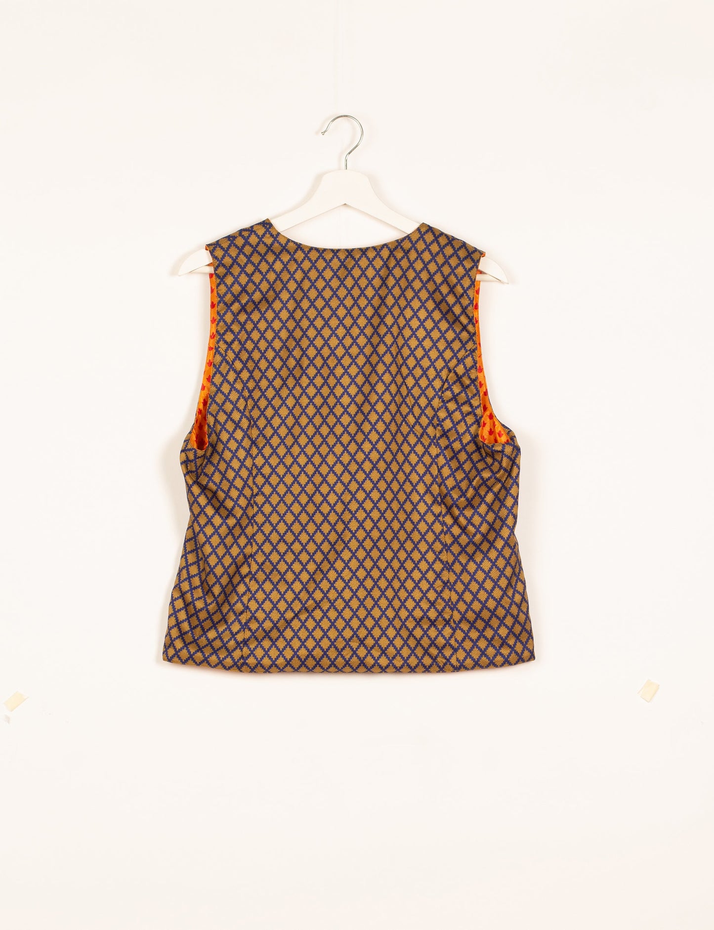 Day Waistcoat made from repurposed saris with macramé-covered buttons, showcasing eco clothing and recycled sari fashion for an eco-friendly, upcycled women's garment.