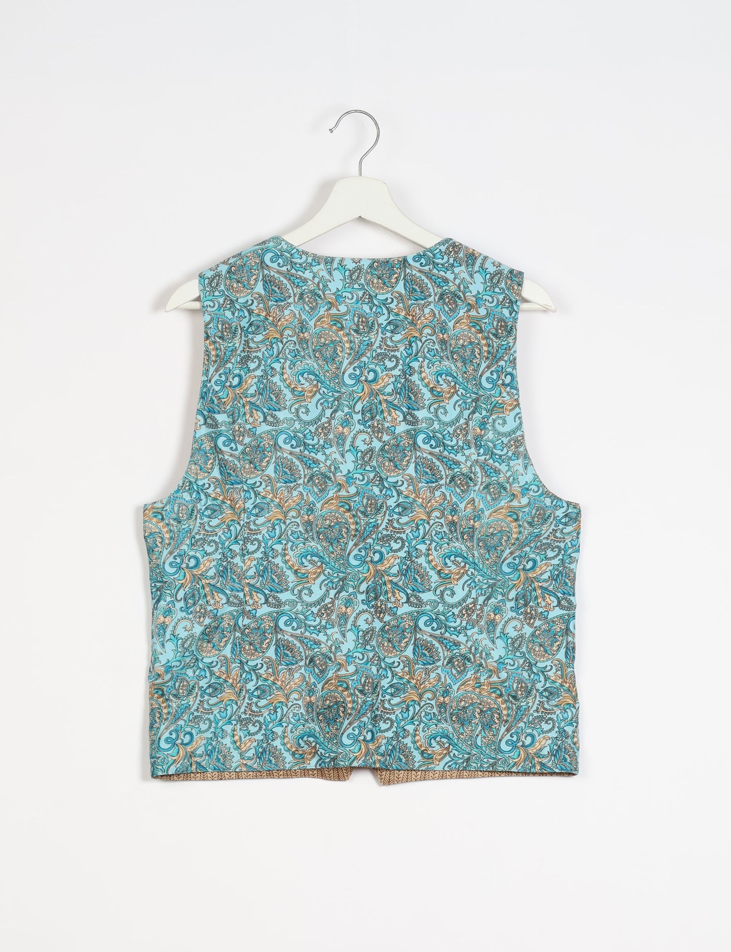 Day Waistcoat made from repurposed saris with macramé-covered buttons, showcasing eco clothing and recycled sari fashion for an eco-friendly, upcycled women's garment.