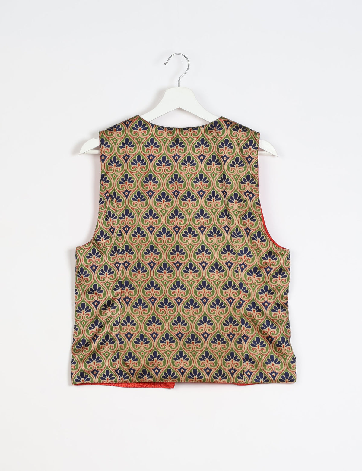 Beige Indian ethnic waistcoat with blue and red floral pattern, sleeveless, shown from back on white hanger