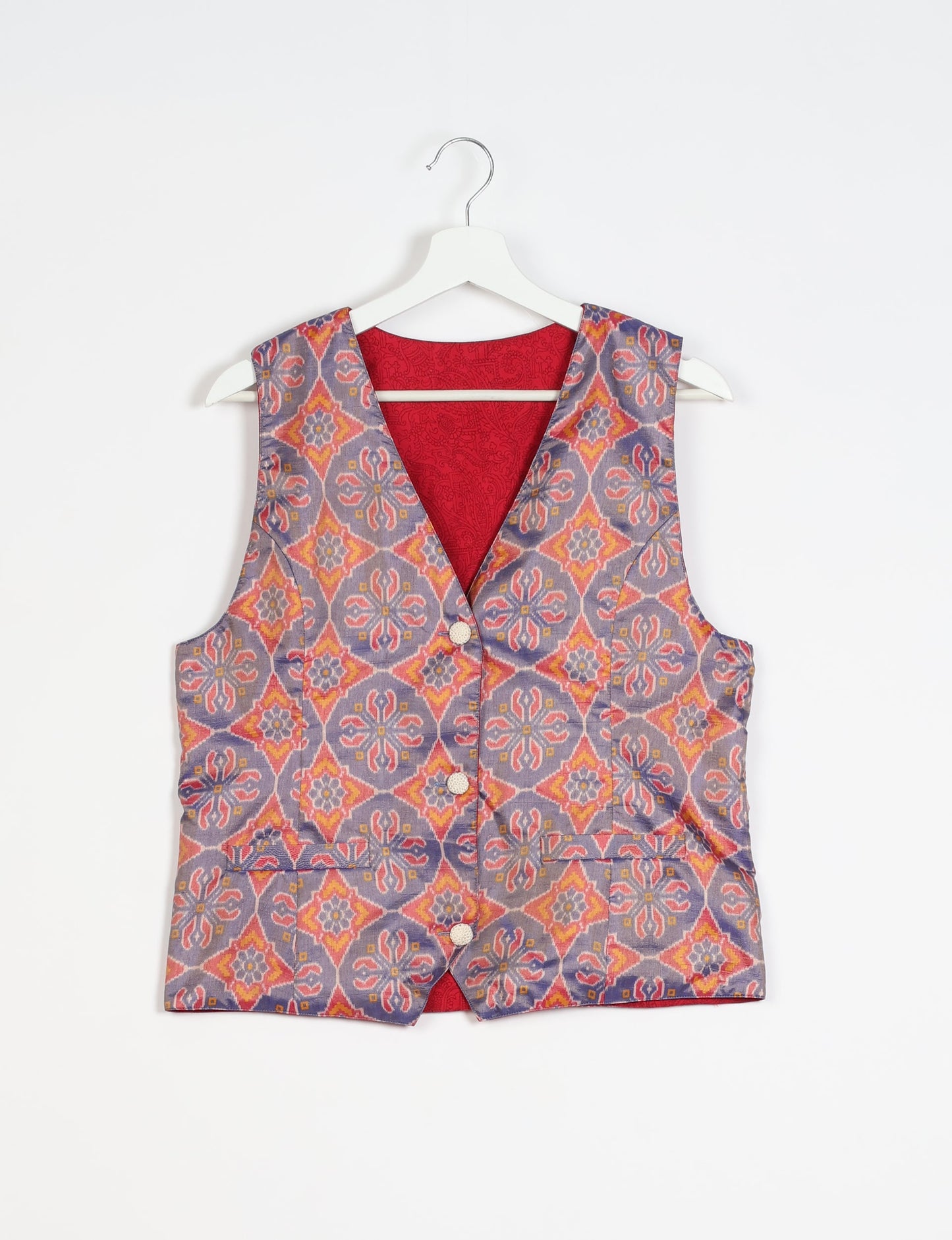 Day Waistcoat made from repurposed saris with macramé-covered buttons, showcasing eco clothing and recycled sari fashion for an eco-friendly, upcycled women's garment.