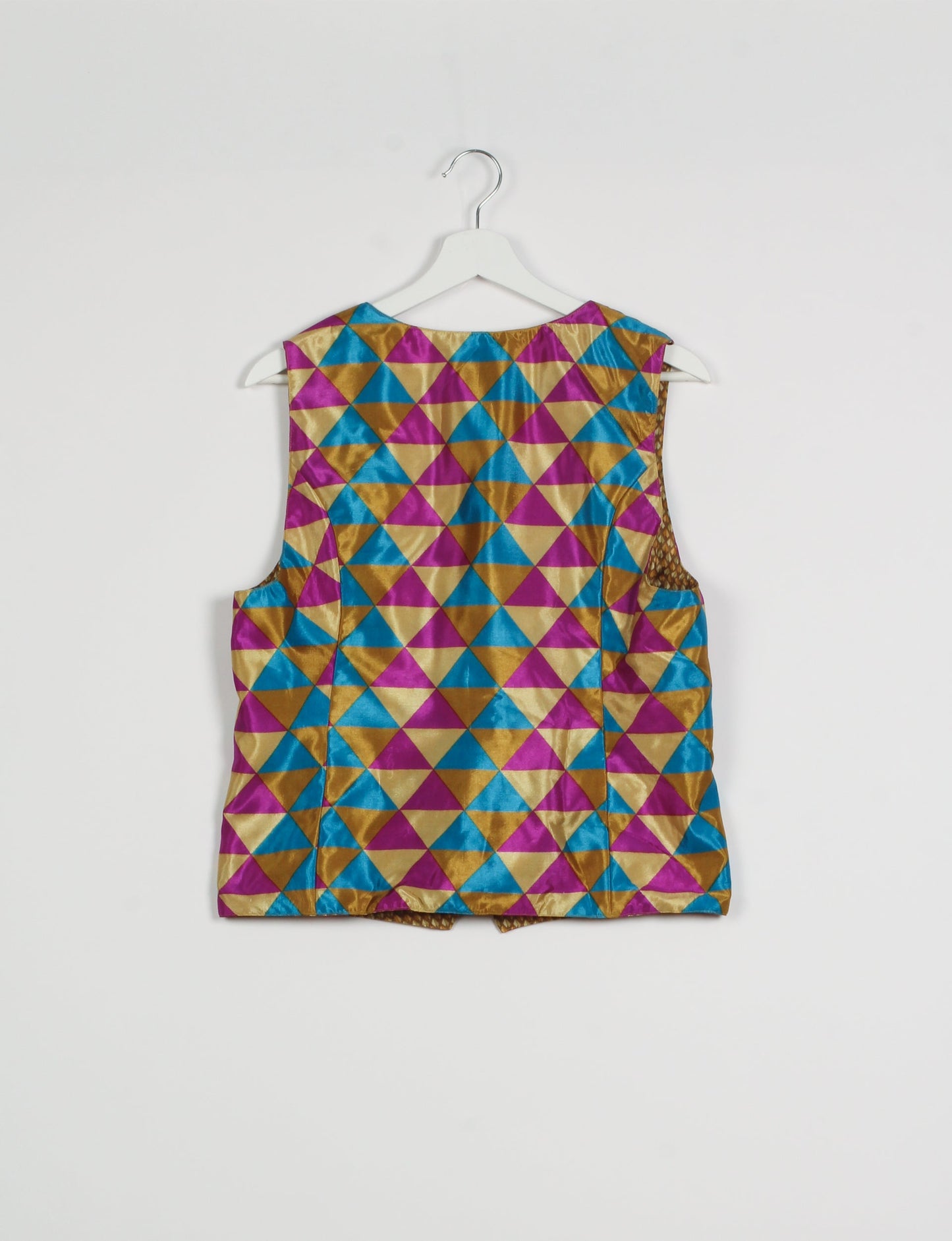 Day Waistcoat made from repurposed saris with macramé-covered buttons, showcasing eco clothing and recycled sari fashion for an eco-friendly, upcycled women's garment.