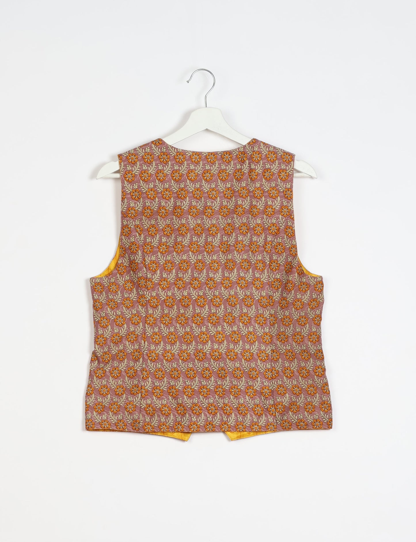 Day Waistcoat made from repurposed saris with macramé-covered buttons, showcasing eco clothing and recycled sari fashion for an eco-friendly, upcycled women's garment.