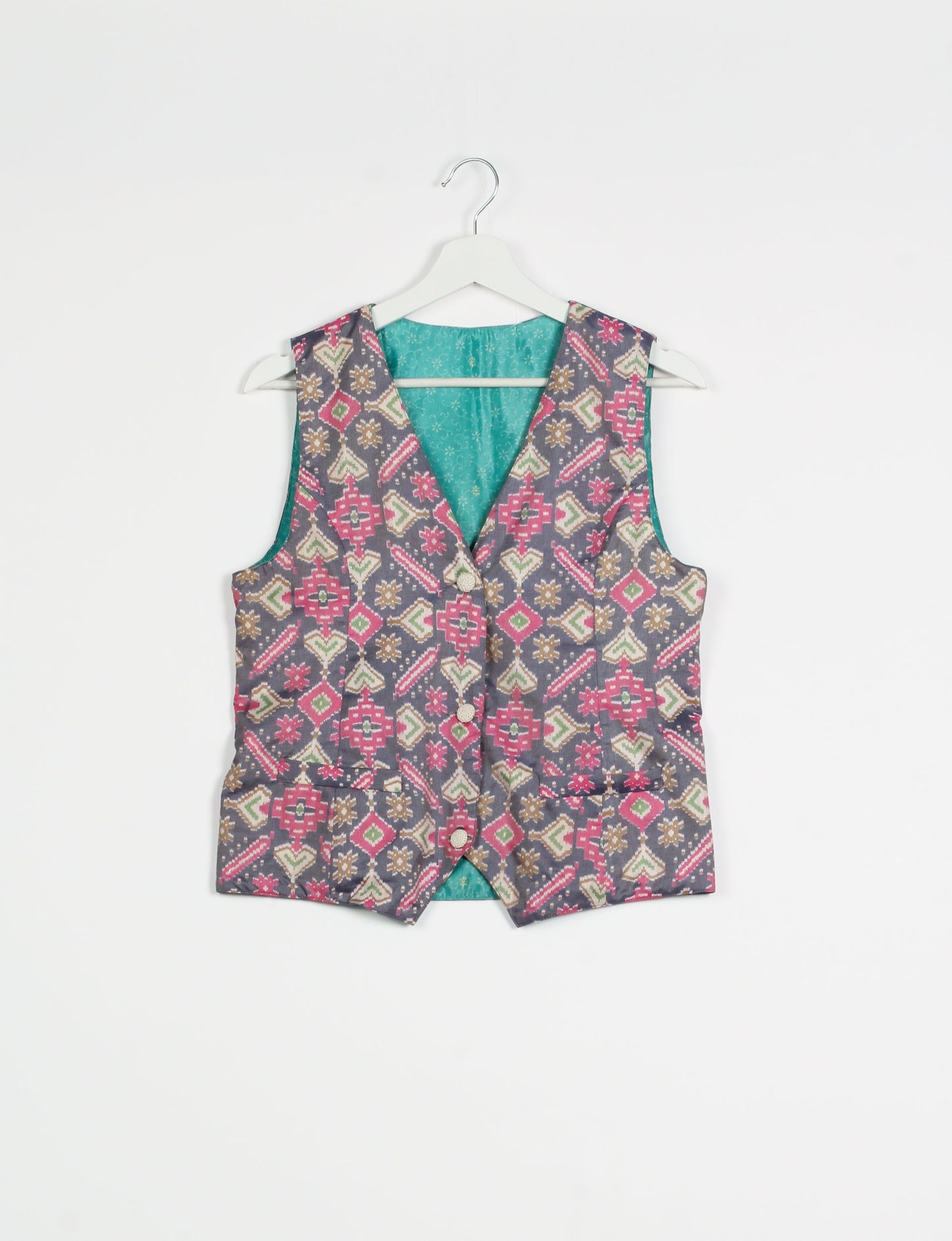 Day Waistcoat made from repurposed saris with macramé-covered buttons, showcasing eco clothing and recycled sari fashion for an eco-friendly, upcycled women's garment.