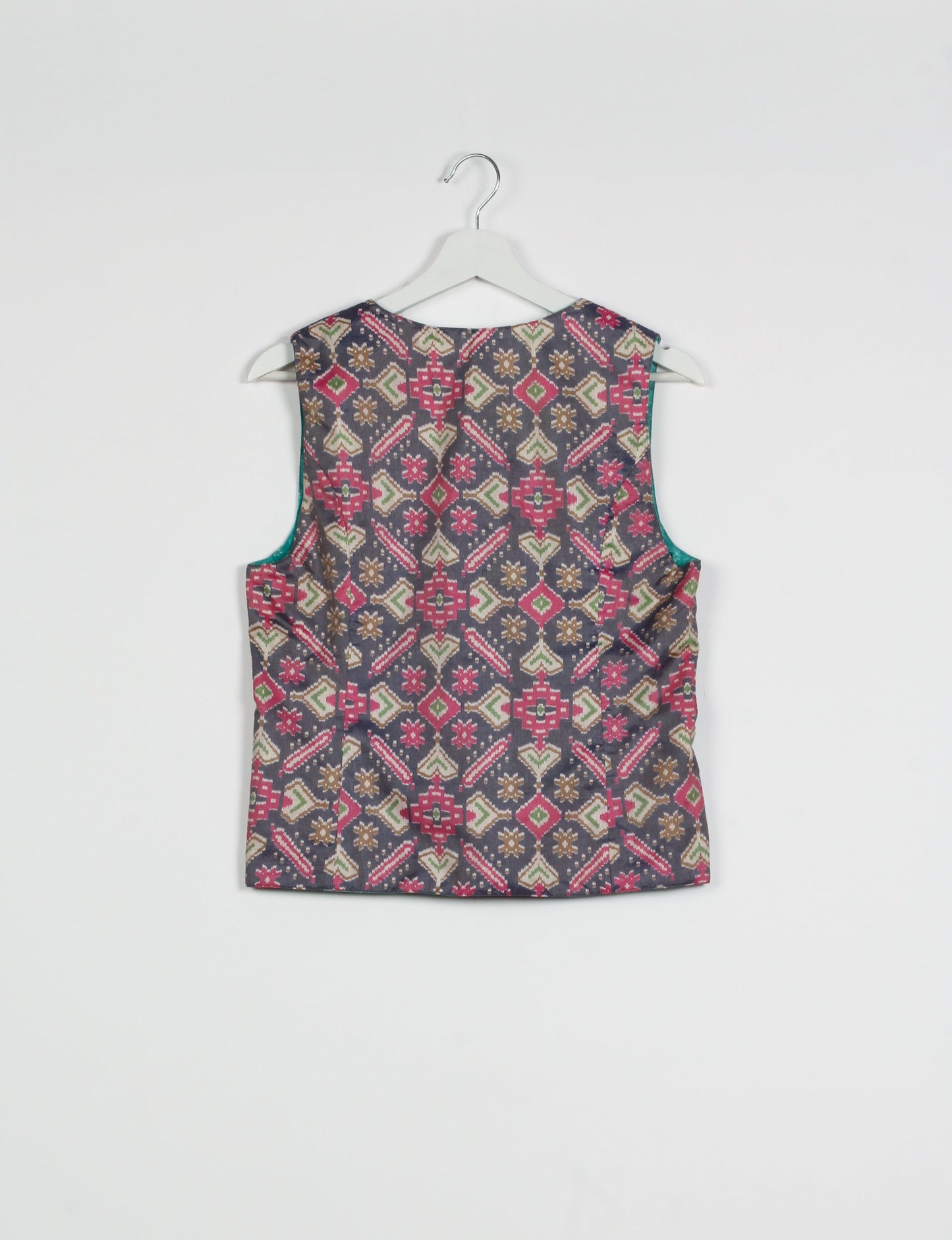 Day Waistcoat made from repurposed saris with macramé-covered buttons, showcasing eco clothing and recycled sari fashion for an eco-friendly, upcycled women's garment.