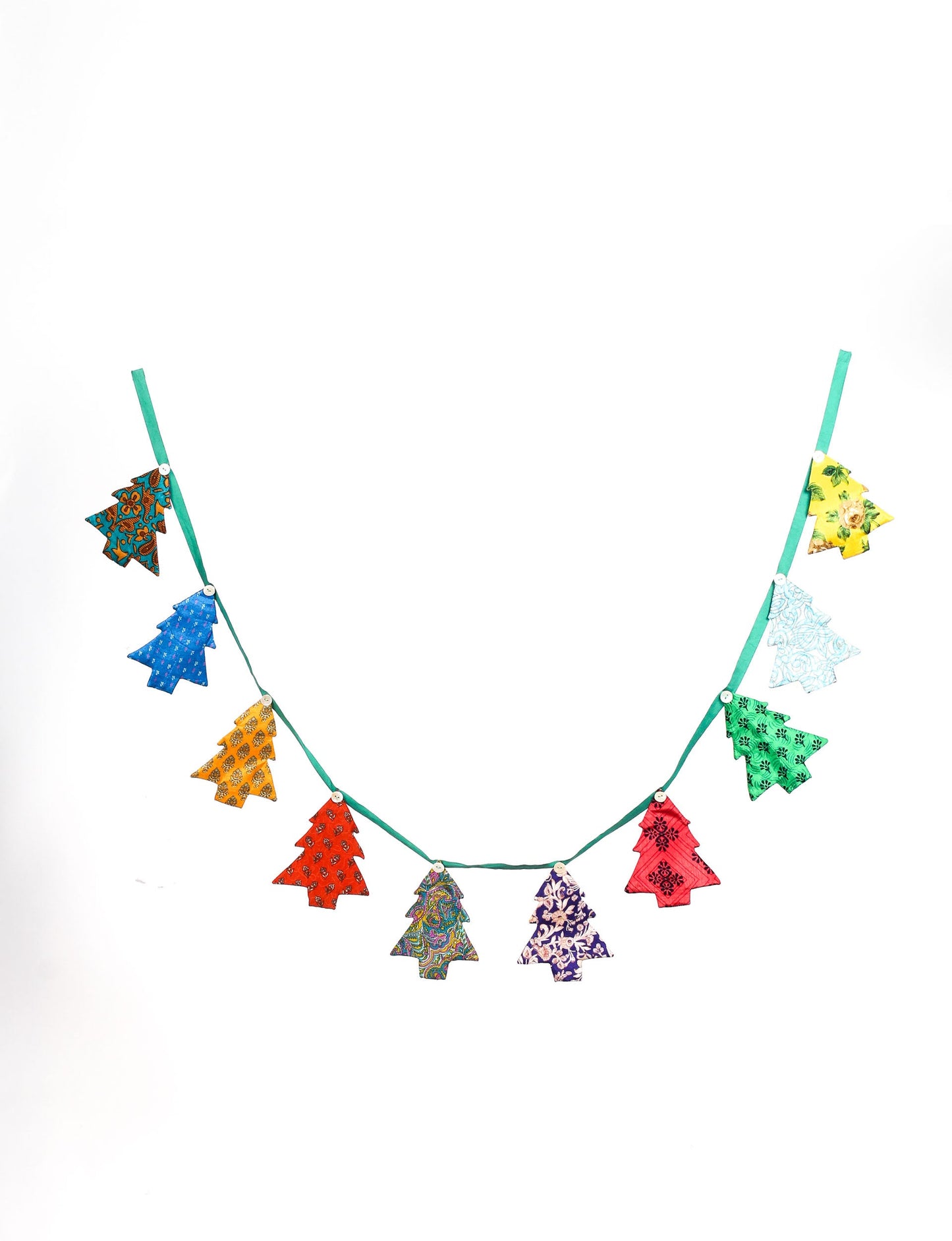 Eco-friendly Christmas bunting featuring Christmas tree patches made from recycled saris, attached to canvas lace with buttons. A sustainable, upcycled decoration promoting circular fashion and ethical holiday decor.