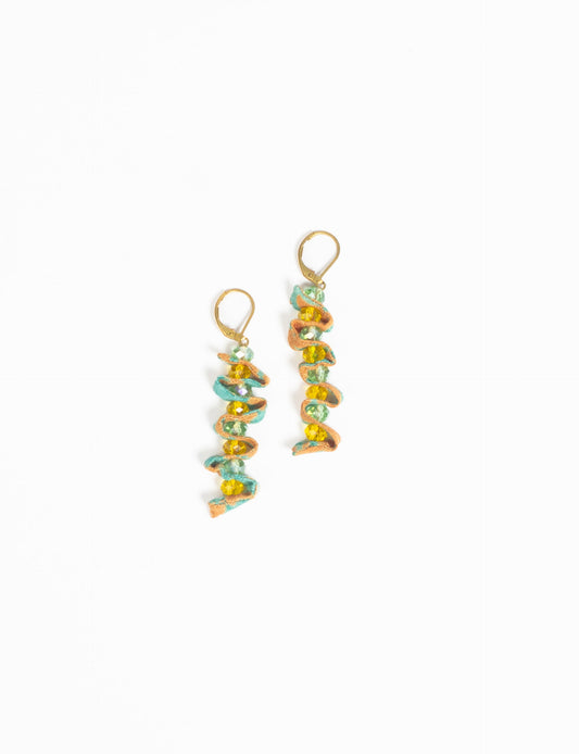 Wavy Dangler Earrings made from upcycled materials, showcasing eco-friendly fashion and sustainable women's clothing. A delicate blend of style and environmentally friendly design, perfect for those who value conscious clothing and circular fashion.