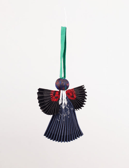 Angel Christmas Ornament made from upcycled saris, featuring pleated arms and body. A sustainable, eco-friendly holiday decoration, embodying recycled fashion and upcycling in festive style.





