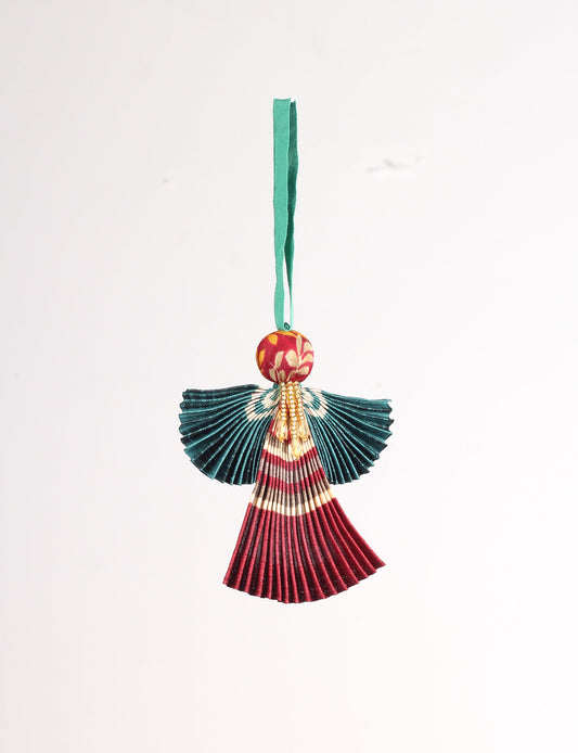 Angel Christmas Ornament made from upcycled saris, featuring pleated arms and body. A sustainable, eco-friendly holiday decoration, embodying recycled fashion and upcycling in festive style.





