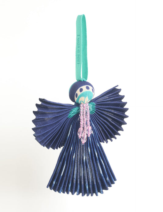 Angel Christmas Ornament made from upcycled saris, featuring pleated arms and body. A sustainable, eco-friendly holiday decoration, embodying recycled fashion and upcycling in festive style.





