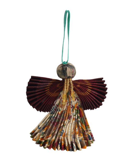Angel Christmas Ornament made from upcycled saris, featuring pleated arms and body. A sustainable, eco-friendly holiday decoration, embodying recycled fashion and upcycling in festive style.





