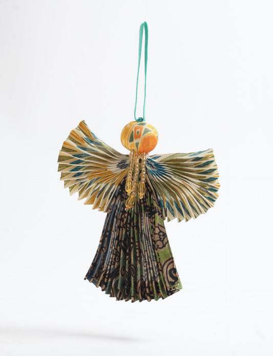 Angel Christmas Ornament made from upcycled saris, featuring pleated arms and body. A sustainable, eco-friendly holiday decoration, embodying recycled fashion and upcycling in festive style.





