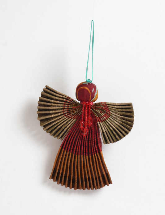 Angel Christmas Ornament made from upcycled saris, featuring pleated arms and body. A sustainable, eco-friendly holiday decoration, embodying recycled fashion and upcycling in festive style.





