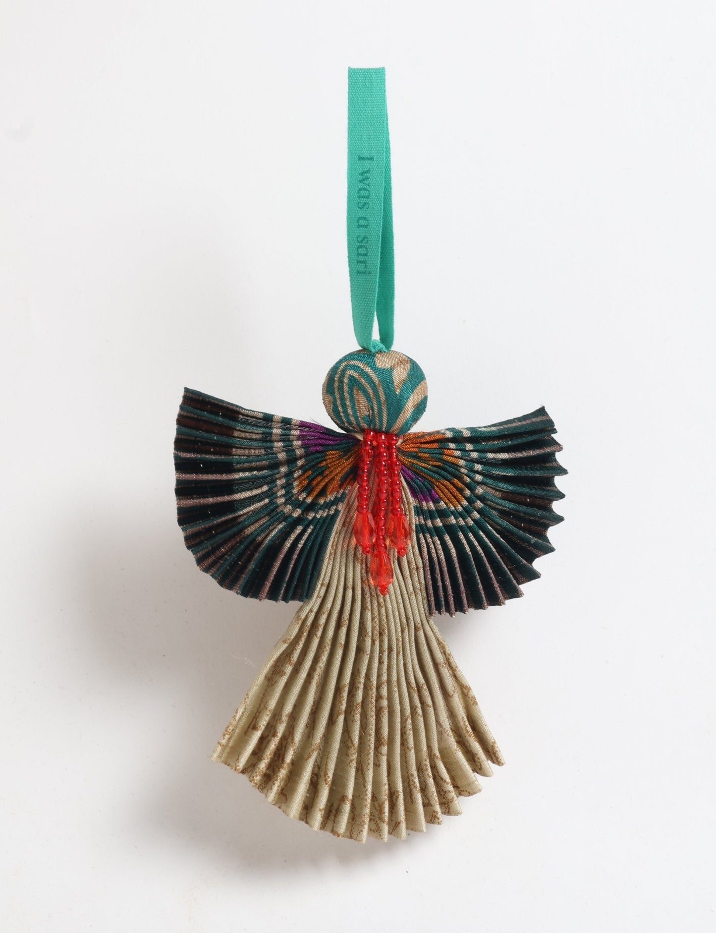 Angel Christmas Ornament made from upcycled saris, featuring pleated arms and body. A sustainable, eco-friendly holiday decoration, embodying recycled fashion and upcycling in festive style.





