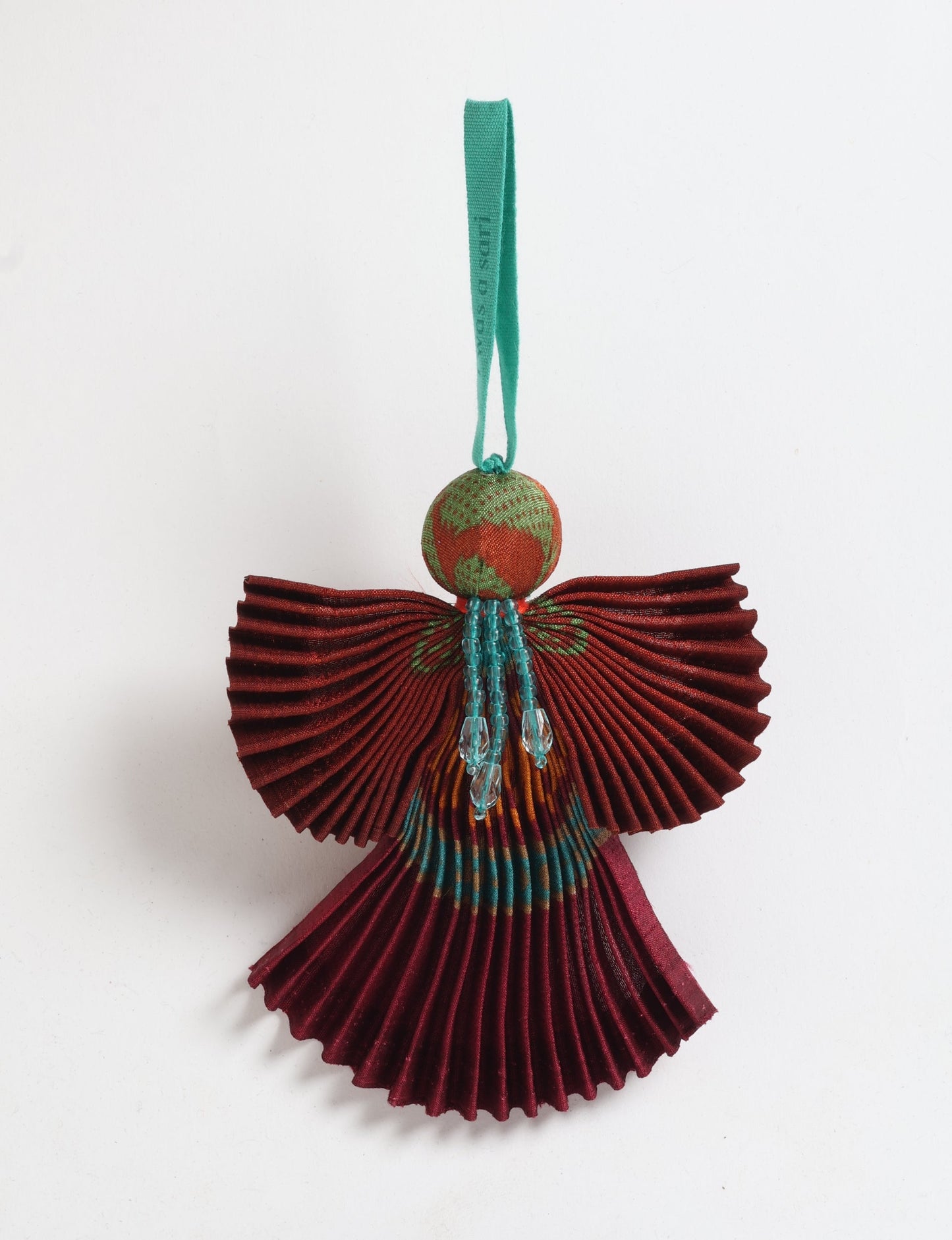Angel Christmas Ornament made from upcycled saris, featuring pleated arms and body. A sustainable, eco-friendly holiday decoration, embodying recycled fashion and upcycling in festive style.





