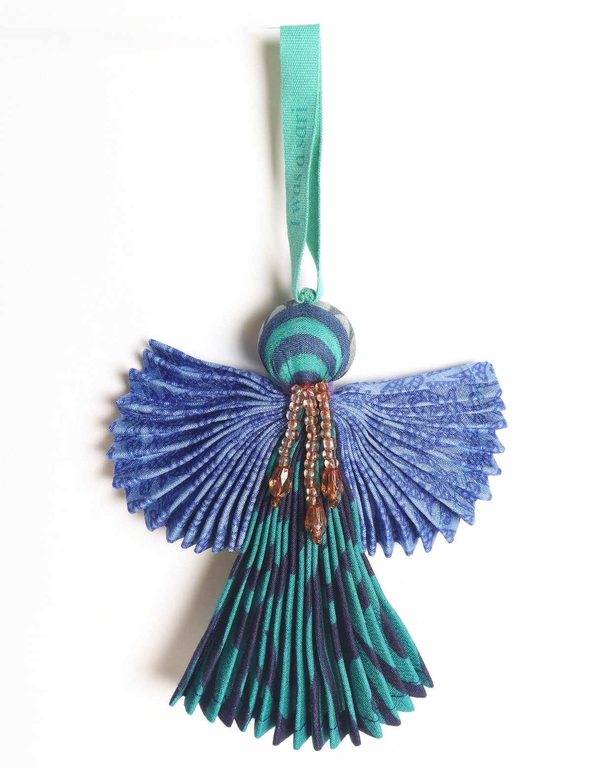 Angel Christmas Ornament made from upcycled saris, featuring pleated arms and body. A sustainable, eco-friendly holiday decoration, embodying recycled fashion and upcycling in festive style.





