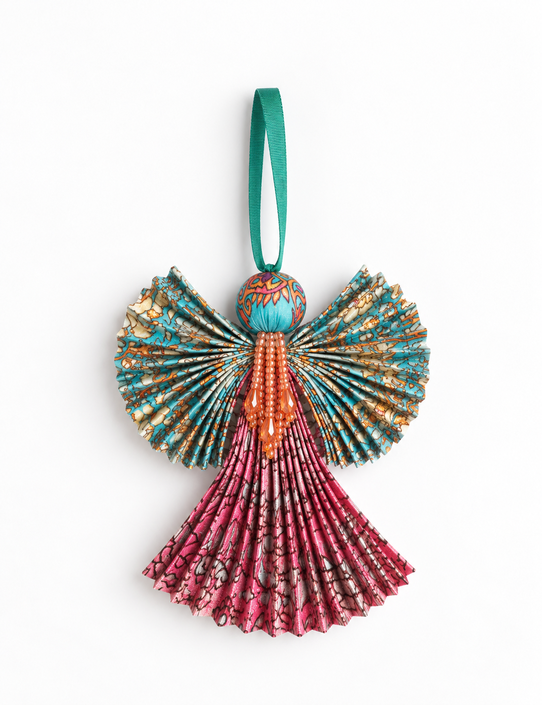 Angel Christmas Ornament made from upcycled saris, featuring pleated arms and body. A sustainable, eco-friendly holiday decoration, embodying recycled fashion and upcycling in festive style.





