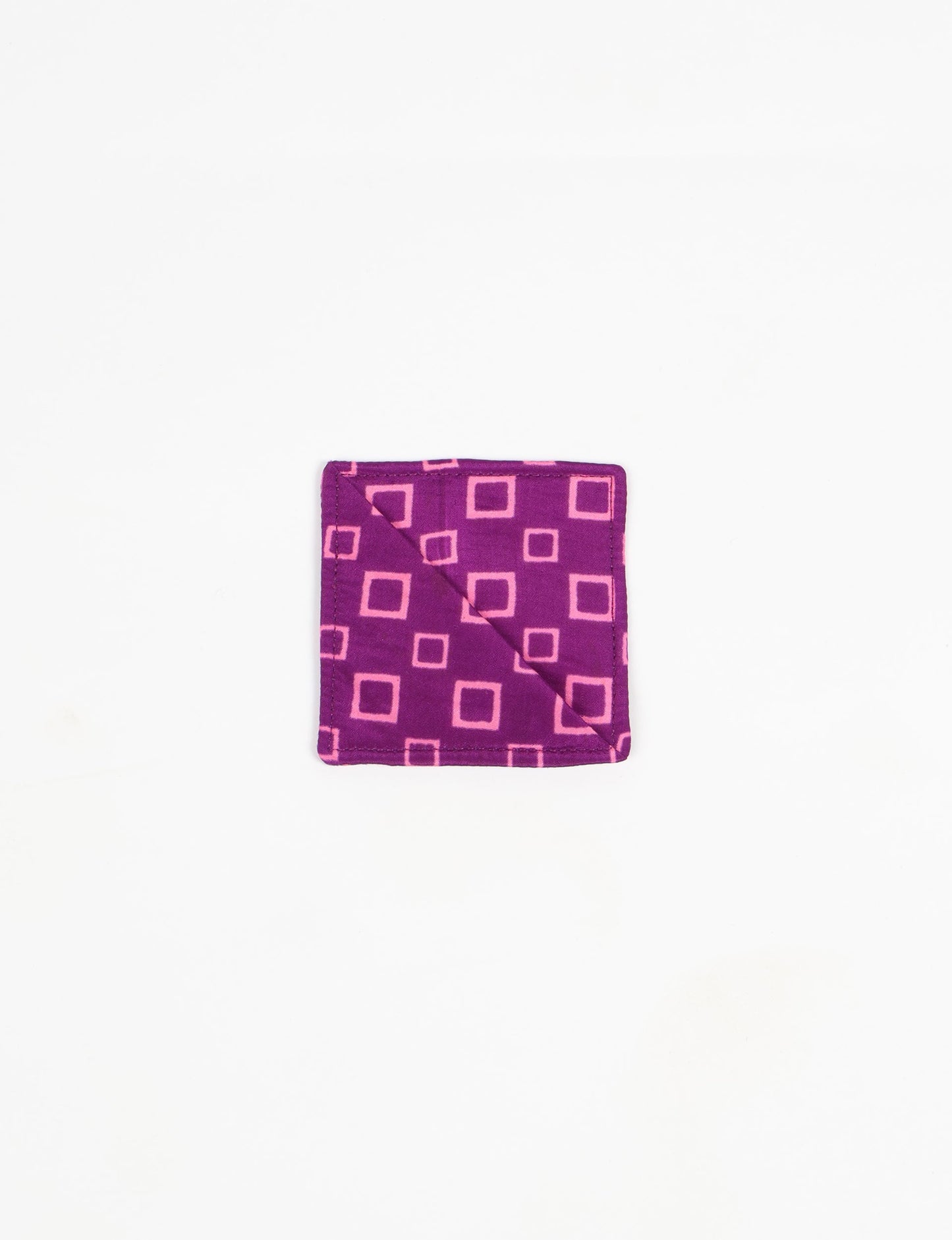 Colorful square-shaped corner bookmark made from recycled sari textiles, representing repurposed clothing, fair trade fashion, and ethical fashion. An earth-friendly product made from textile waste, aligning with carbon neutral clothing values.