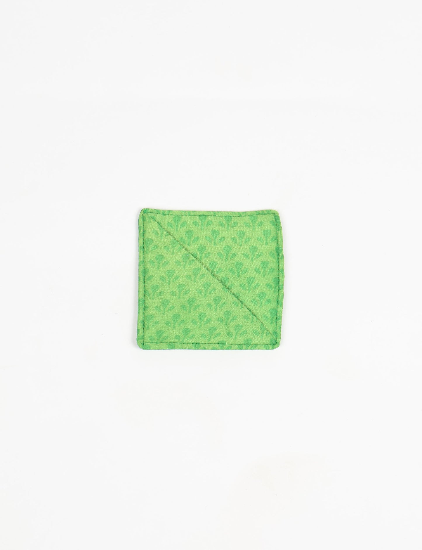 Colorful square-shaped corner bookmark made from recycled sari textiles, representing repurposed clothing, fair trade fashion, and ethical fashion. An earth-friendly product made from textile waste, aligning with carbon neutral clothing values.