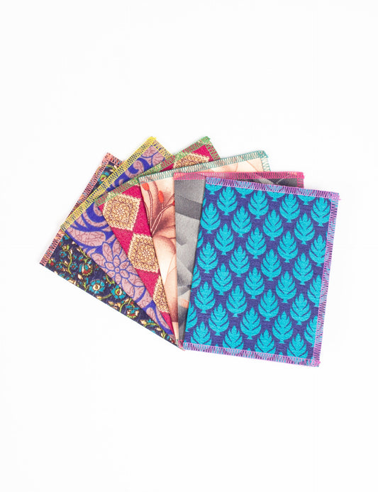 Folded Celebration Card Set, 6 pieces made from recycled sari fabric, showcasing sustainable, eco-friendly, and upcycled fashion principles. Ideal for sending wishes while supporting circular fashion, sustainable apparel, and environmentally friendly practices.