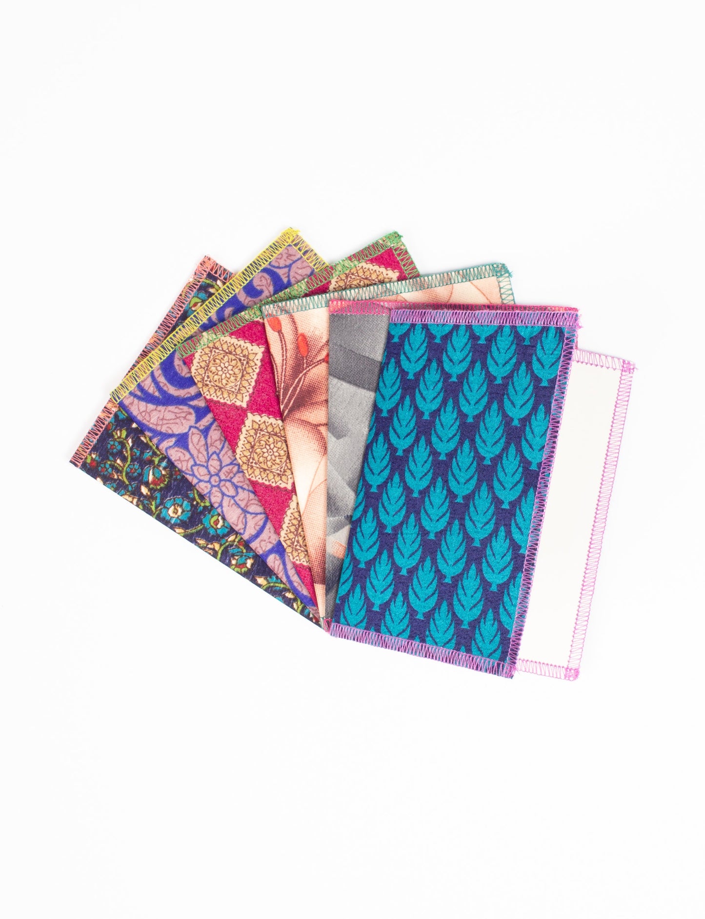 Folded Celebration Card Set, 6 pieces made from recycled sari fabric, showcasing sustainable, eco-friendly, and upcycled fashion principles. Ideal for sending wishes while supporting circular fashion, sustainable apparel, and environmentally friendly practices.