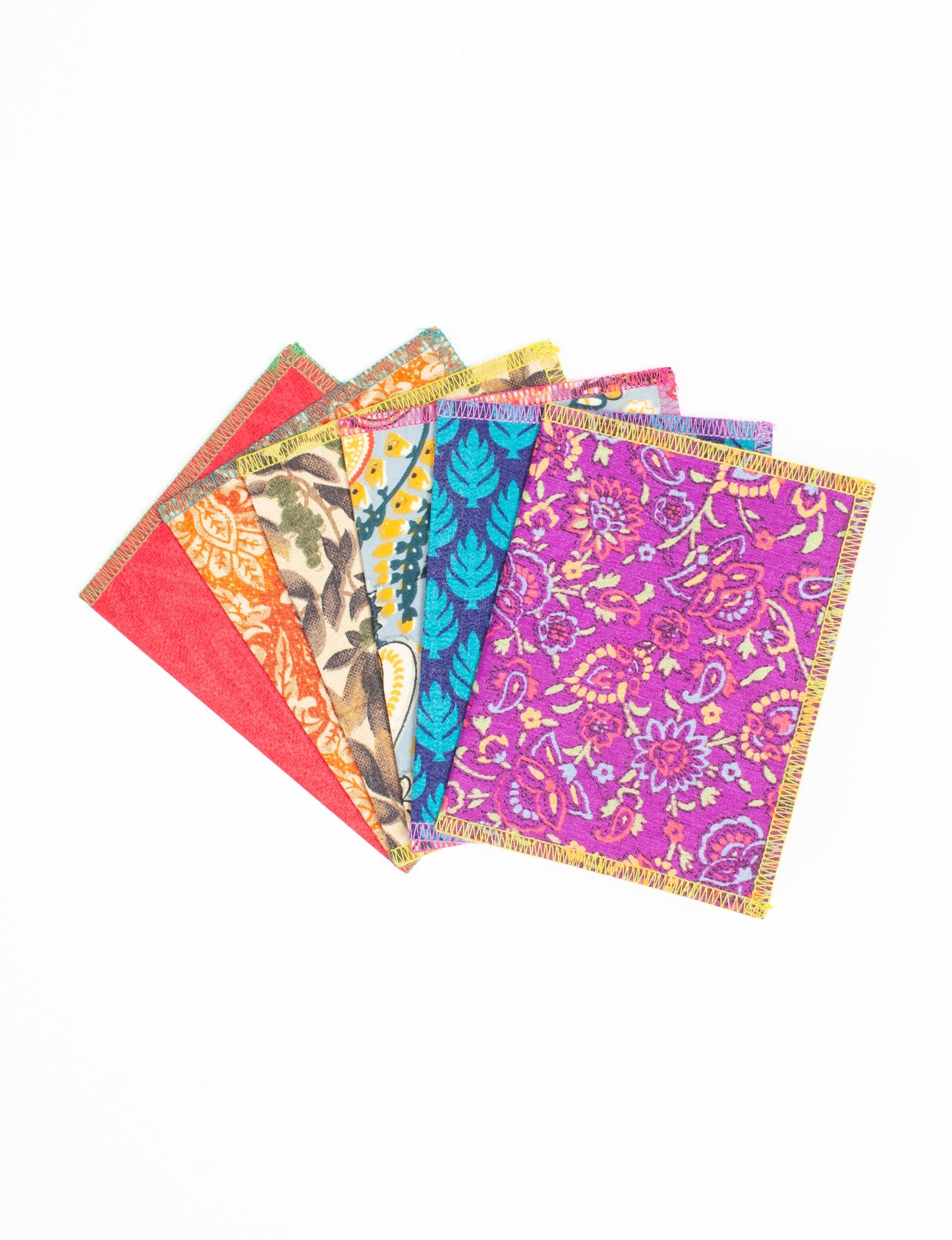 Folded Celebration Card Set, 6 pieces made from recycled sari fabric, showcasing sustainable, eco-friendly, and upcycled fashion principles. Ideal for sending wishes while supporting circular fashion, sustainable apparel, and environmentally friendly practices.