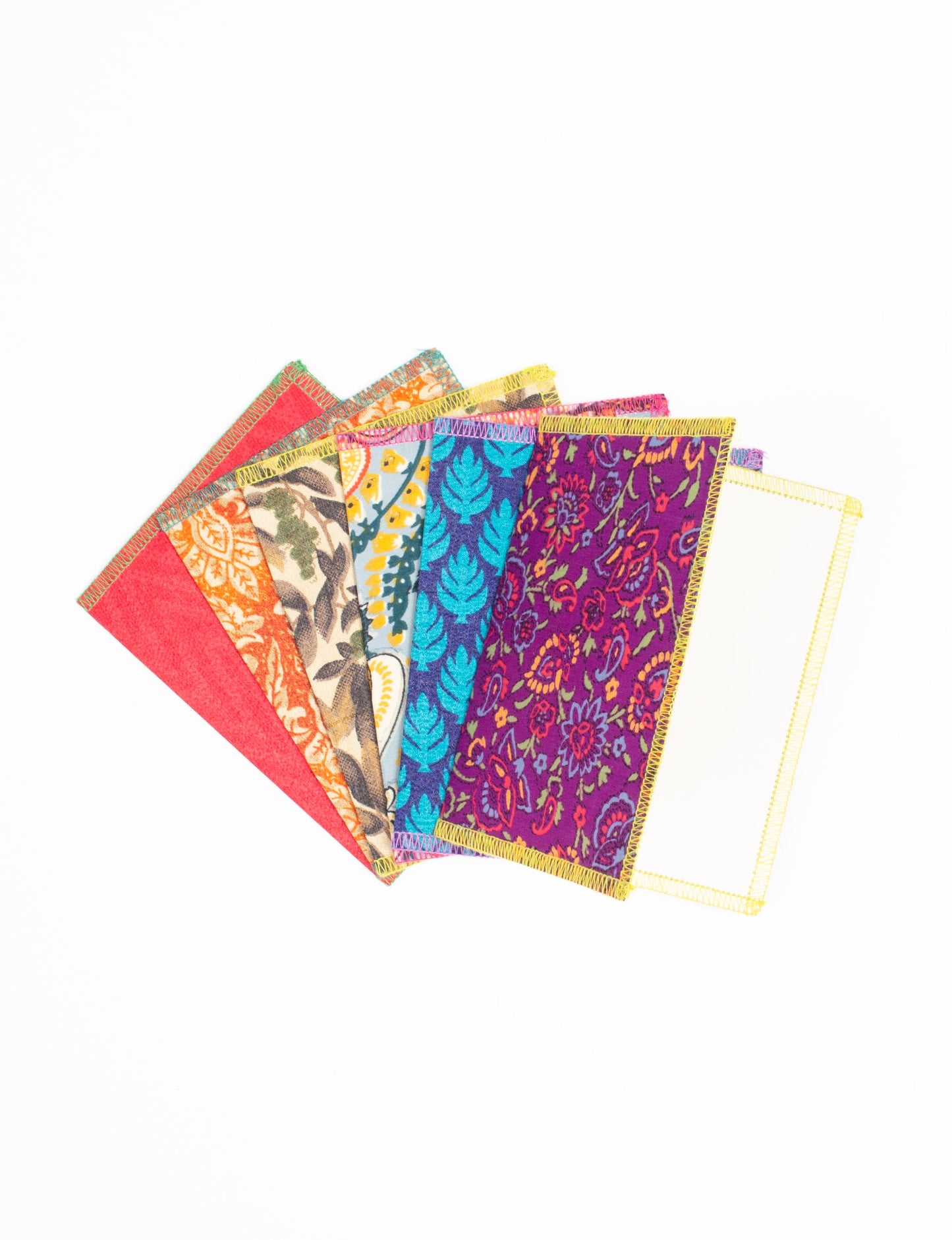 Folded Celebration Card Set, 6 pieces made from recycled sari fabric, showcasing sustainable, eco-friendly, and upcycled fashion principles. Ideal for sending wishes while supporting circular fashion, sustainable apparel, and environmentally friendly practices.