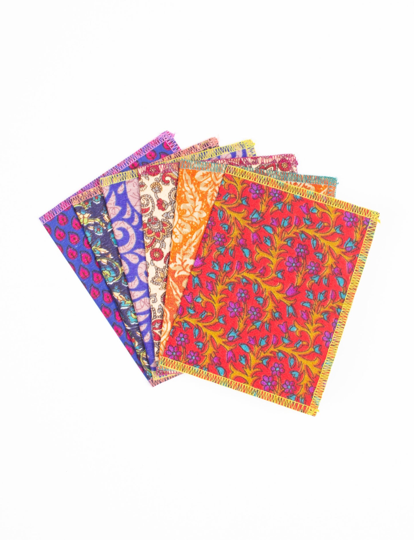 Folded Celebration Card Set, 6 pieces made from recycled sari fabric, showcasing sustainable, eco-friendly, and upcycled fashion principles. Ideal for sending wishes while supporting circular fashion, sustainable apparel, and environmentally friendly practices.