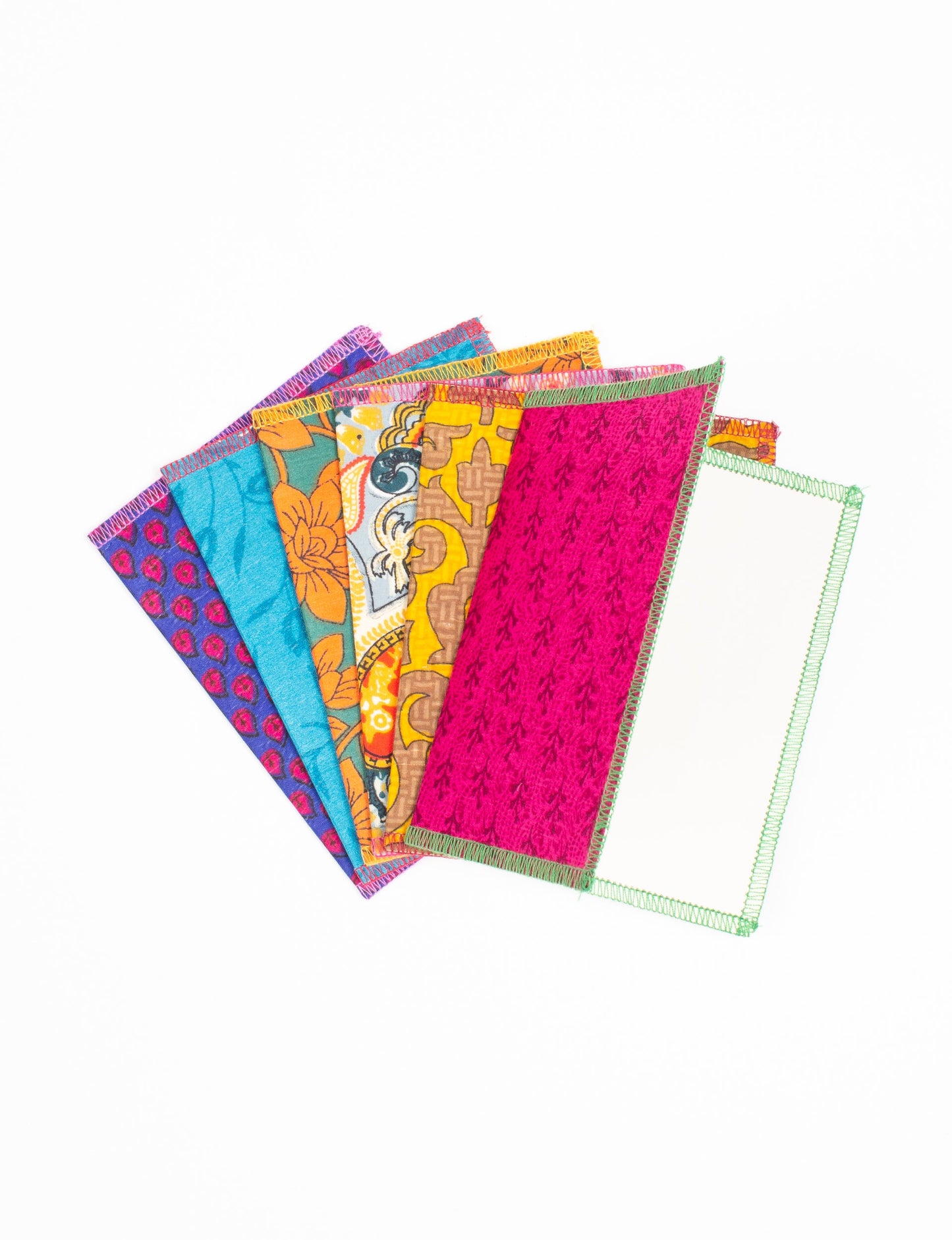 Folded Celebration Card Set, 6 pieces made from recycled sari fabric, showcasing sustainable, eco-friendly, and upcycled fashion principles. Ideal for sending wishes while supporting circular fashion, sustainable apparel, and environmentally friendly practices.