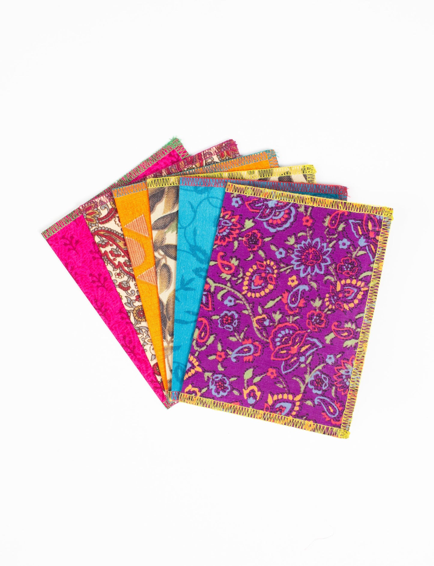 Folded Celebration Card Set, 6 pieces made from recycled sari fabric, showcasing sustainable, eco-friendly, and upcycled fashion principles. Ideal for sending wishes while supporting circular fashion, sustainable apparel, and environmentally friendly practices.